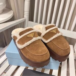 Prada Women's Brown Shearling Clogs